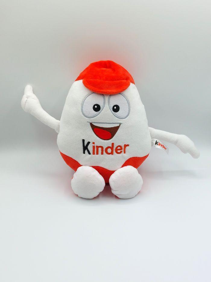 Peluche doudou œuf KINDER FERRERO Kinderino et sa casquette environ 34 cm - photo numéro 1