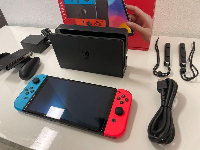 Nintendo Switch OLED Édition (Neuf ) avec jeux et accessoires - photo numéro 4