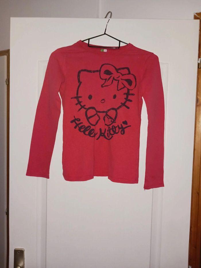 Vend t-shirt longue manche fille 8 ans United of Benetton - photo numéro 1