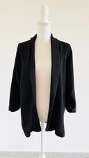 Veste type blazer noir d'une boutique indépendante