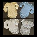 Lot de 4 bodies en 3 ans. Absorba et petit bateau