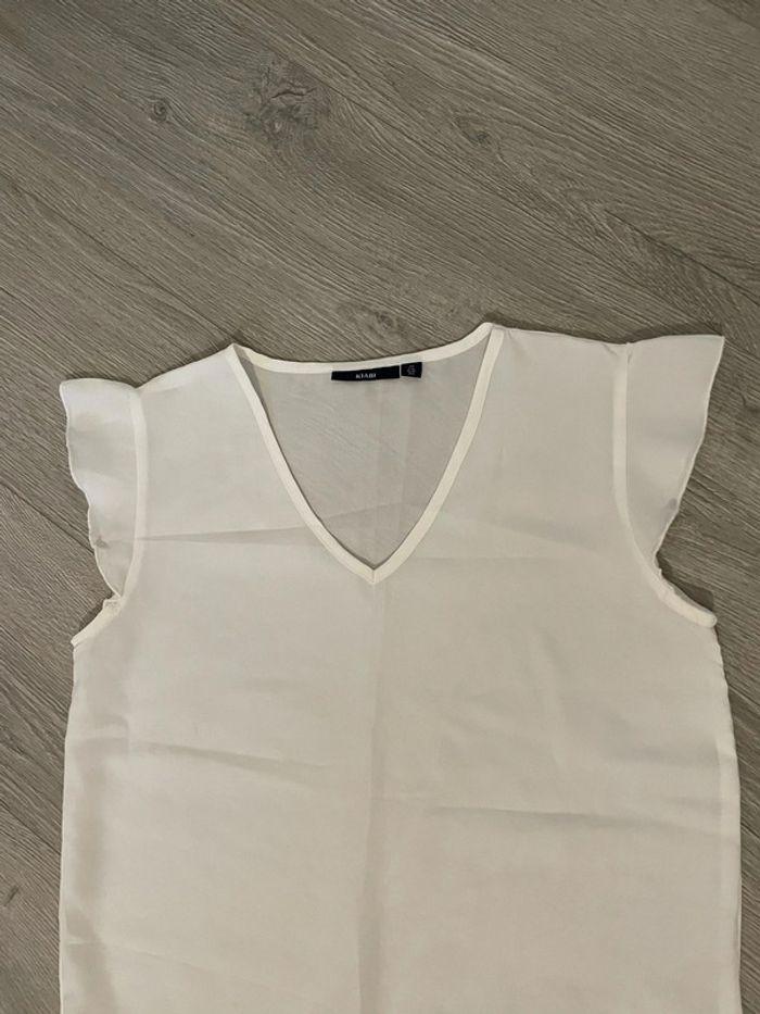 Blouse à manches courtes volant blanc dentelle en bas kiabi taille 36 - photo numéro 3