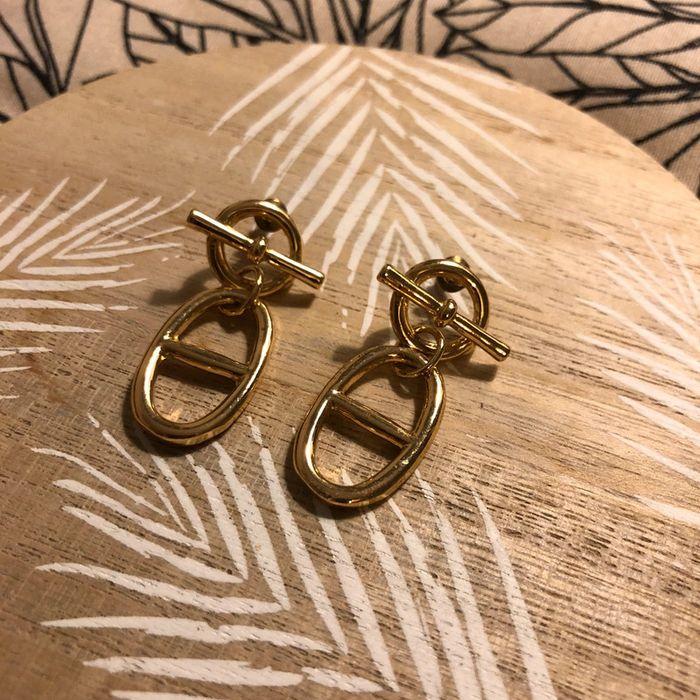 Paire boucles d’oreilles dorée - photo numéro 1