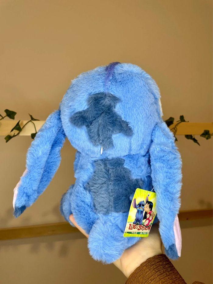 Peluche Disney Stitch avec un Coeur 🩵 - photo numéro 3