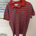 Polo  Lacoste orange et bleu, taille 10 ans