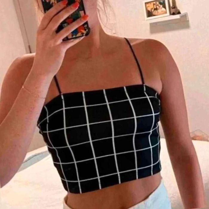 Crop  top noir  et  blanc

Taille  xs
Shein - photo numéro 1