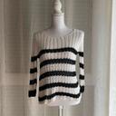 Pull avec rayure blanche et noir transparent maille