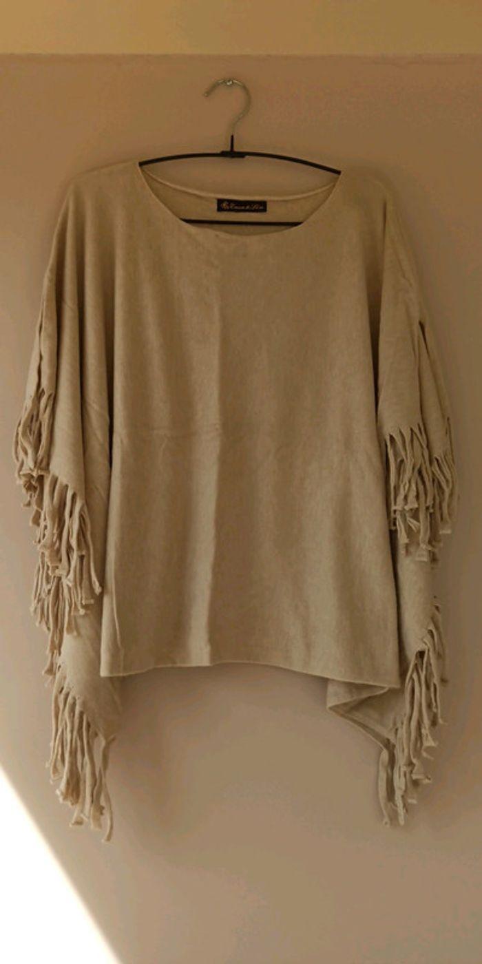 Poncho tout doux en parfait etat