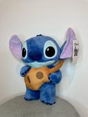 Peluche Disney Stitch avec ça guitare