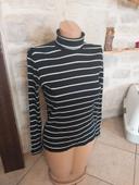 Pull femme col roulé taille S noir et blanc en tres bon etat