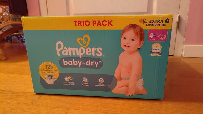 Couches Pampers trio pack Pampers baby dry  taille 4+