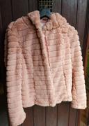 Veste en fausse fourrure rose