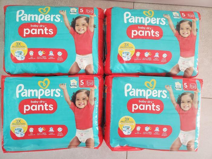 Lot de 4 paquets de couches culottes PAMPERS baby dry pants taille 5 - photo numéro 1