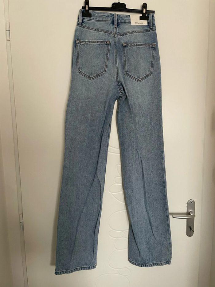 Jean bleu clair taille haute coupe straight flare jambe large effet déchiré stradivarius taille 32 - photo numéro 5