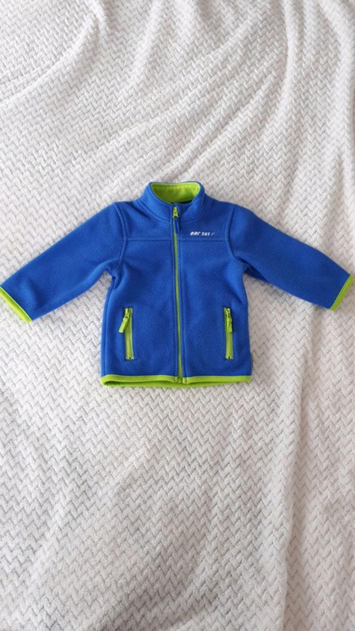 Gilet zippé polaire bleu et vert fluo Orchestra 6 mois comme neuf - photo numéro 1