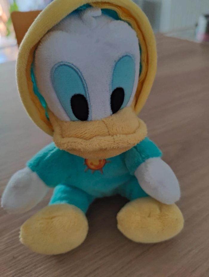 Peluche Donald en grenouillère bleue - photo numéro 7