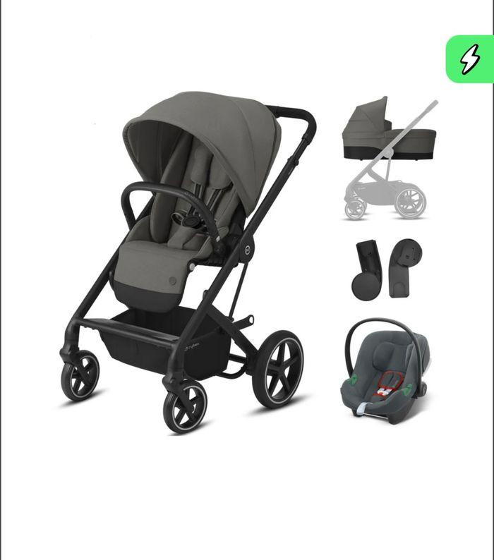 Poussette trio cibex + base isofix - photo numéro 1