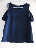 Top bleu, taille 36.