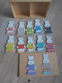 Puzzle en bois pour habiller Mr et Mme lapin de chez Vertbaudet comme neuf