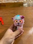 Petite peluche qui fait du bruit en bracelet