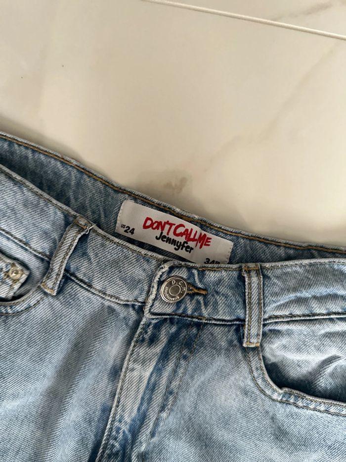 Jeans troué - photo numéro 2