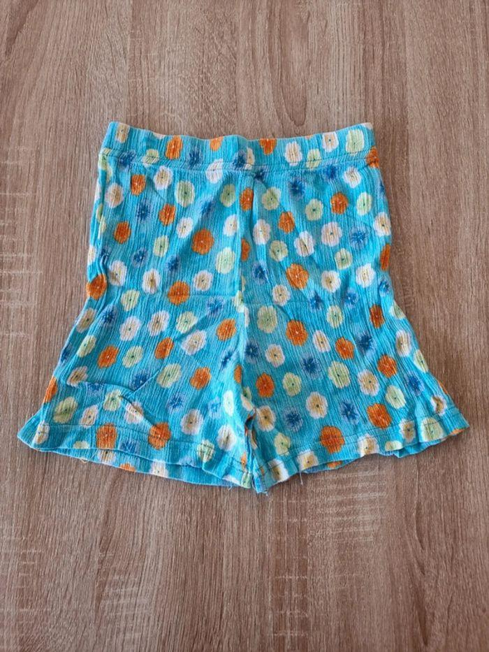 Short bleu à fleurs taille 6 ans 114 cm - photo numéro 1