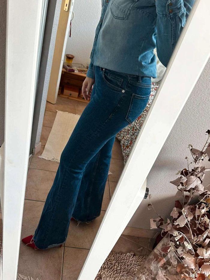 Chemise en jean  détail  sur  poche  avant taille  s/m - photo numéro 6