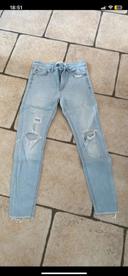 Jeans skinny a trou femme