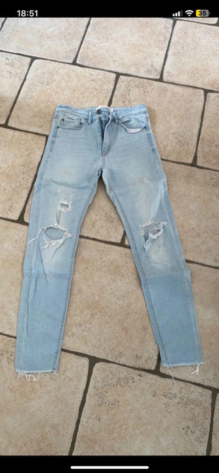 Jeans skinny a trou femme