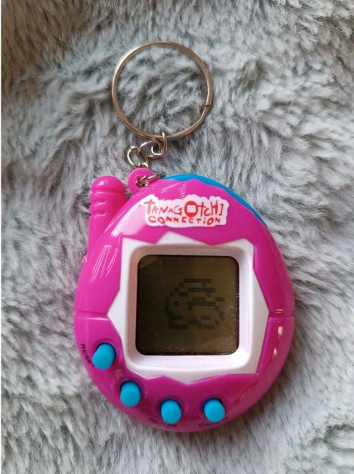 Tamagotchi rose neuf - photo numéro 1