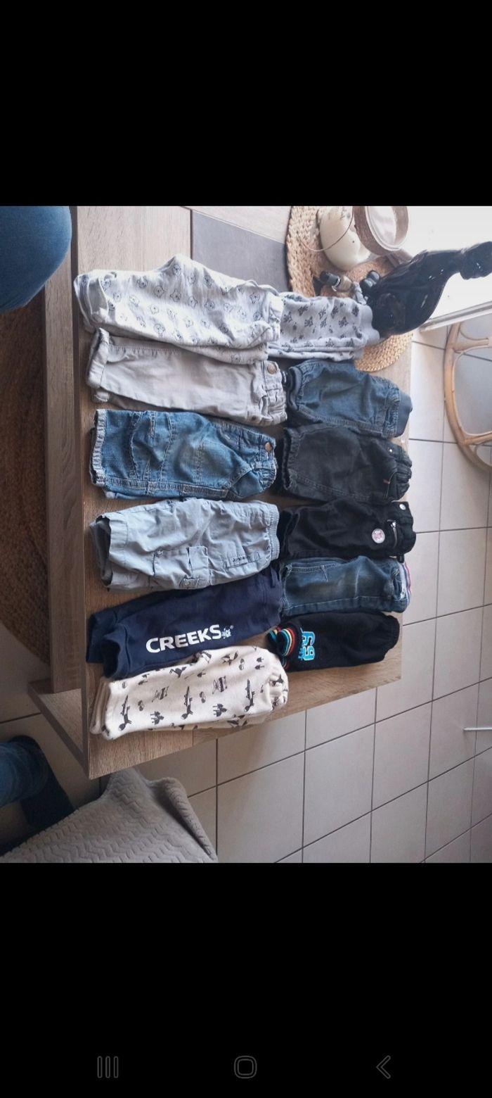 Lot 12 pantalons 6 mois jeans et joggings - photo numéro 1