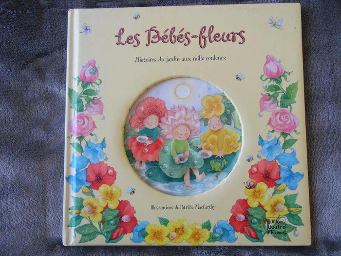 Beau livre "Les bébés fleurs" - photo numéro 1