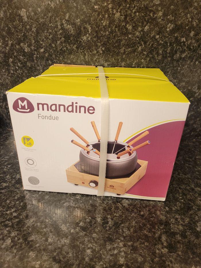 Appareil à fondu ,raclette
Neuf 
Marque Mandine prix 49e99