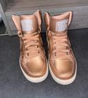 Nike couleur bronze