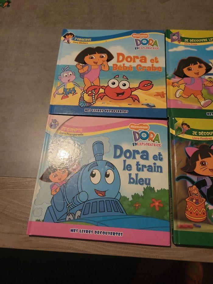 4 livres dora - photo numéro 3