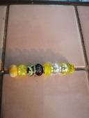 Lot charms jaune /noir neuf