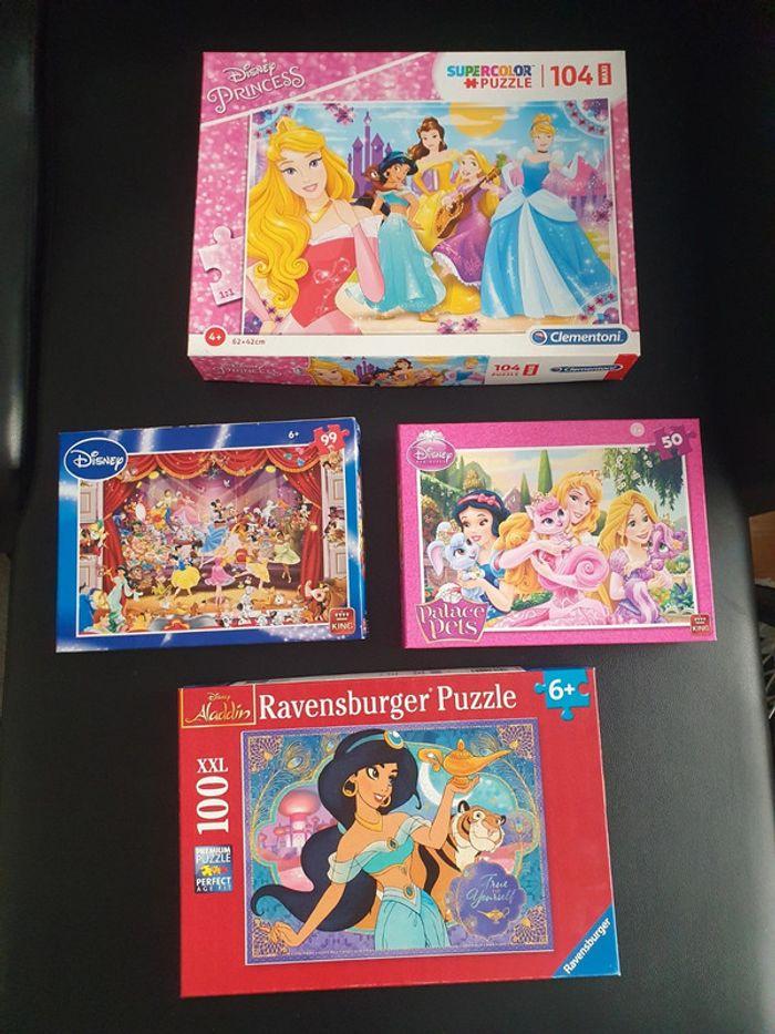 Lot 4 puzzles disney - photo numéro 1