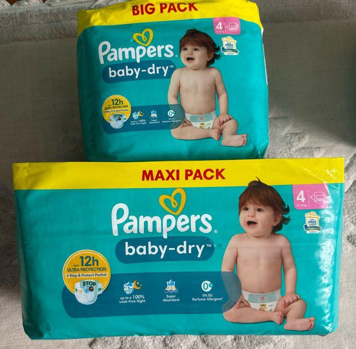 2 paquets de couches Pampers taille 4