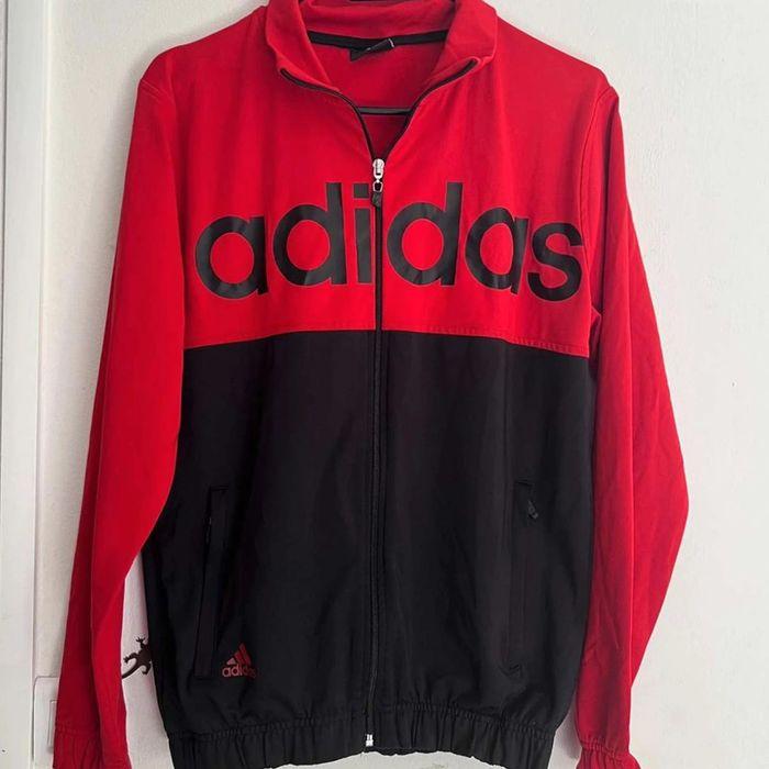 Veste  adidas  rouge et  noire - photo numéro 1