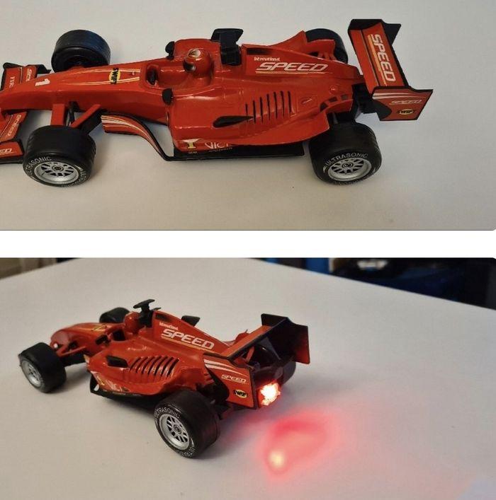 Ferrari F1 jouet enfant avec bruit et lumière arriére - photo numéro 2