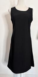 Robe noire droite fendue coté Biche de Bere taille 40