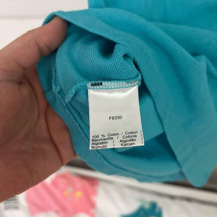 Polo Lacoste bleu turquoise, taille 10 ans en très bon état - photo numéro 4