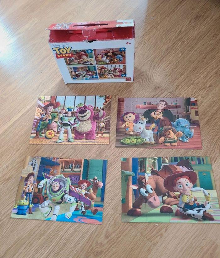 Boite 4 puzzles toy story king pixar - photo numéro 1