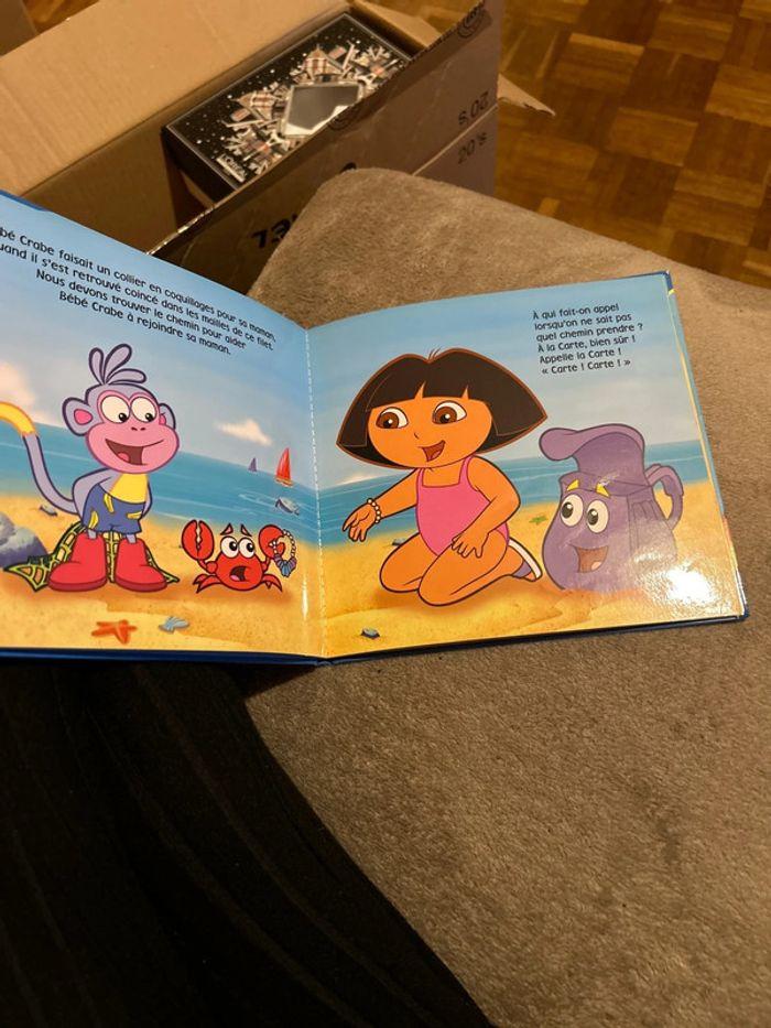 Livre dora bébé plage - photo numéro 2