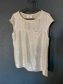 Blouse luisante fermeture éclair sur le côté