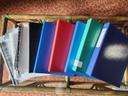 Lot de classeurs + env 200 pochettes transparentes