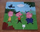 Puzzle et livre les 3 petits cochons 16 pièces